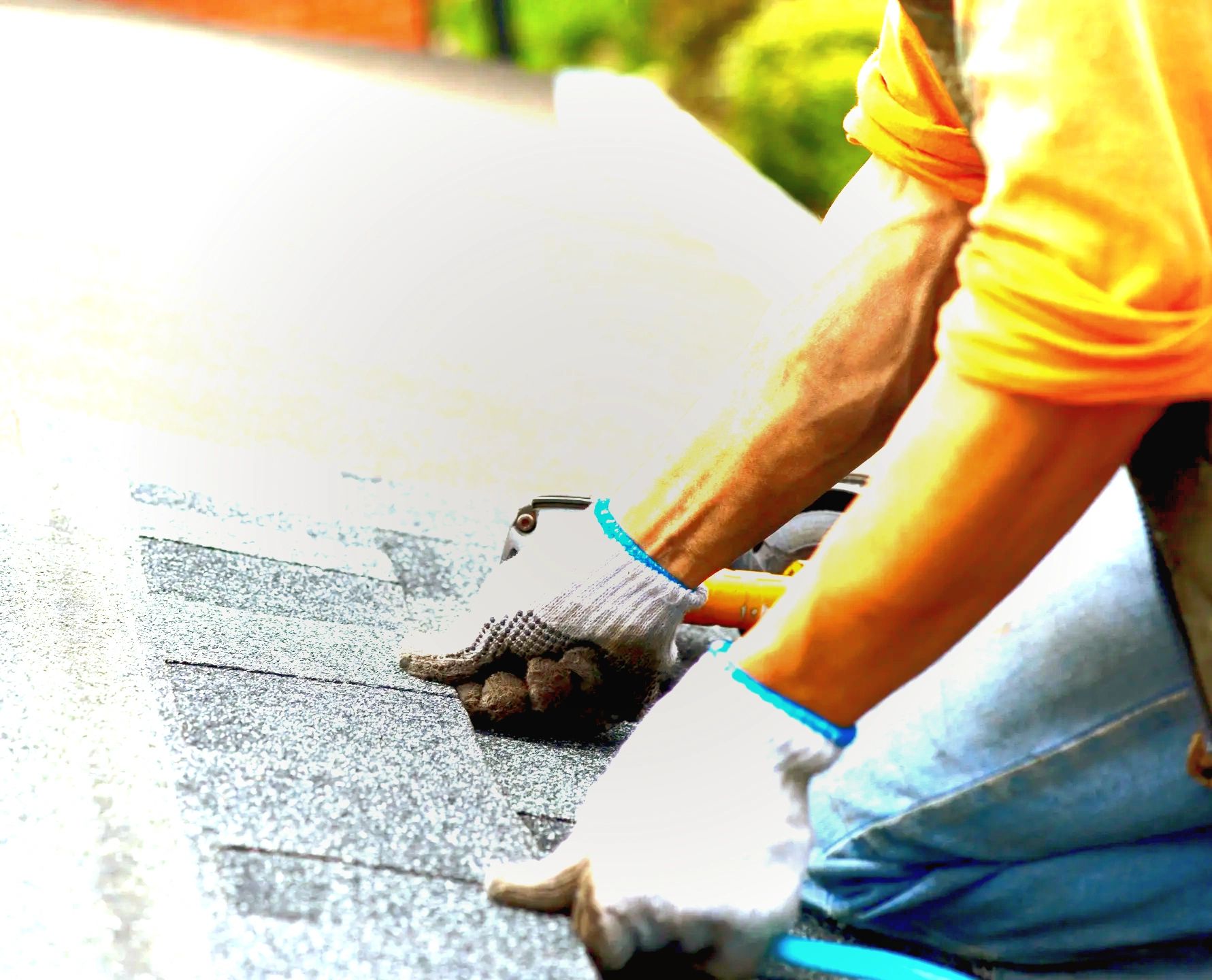 Roofing professional completing a roof installation